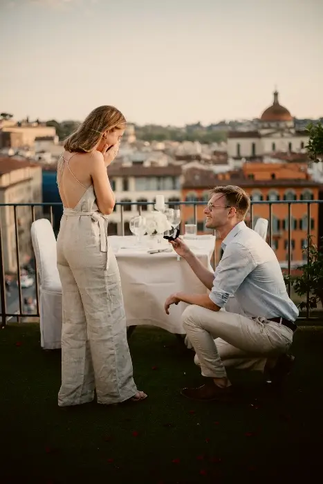romantic proposal in florence kneeling